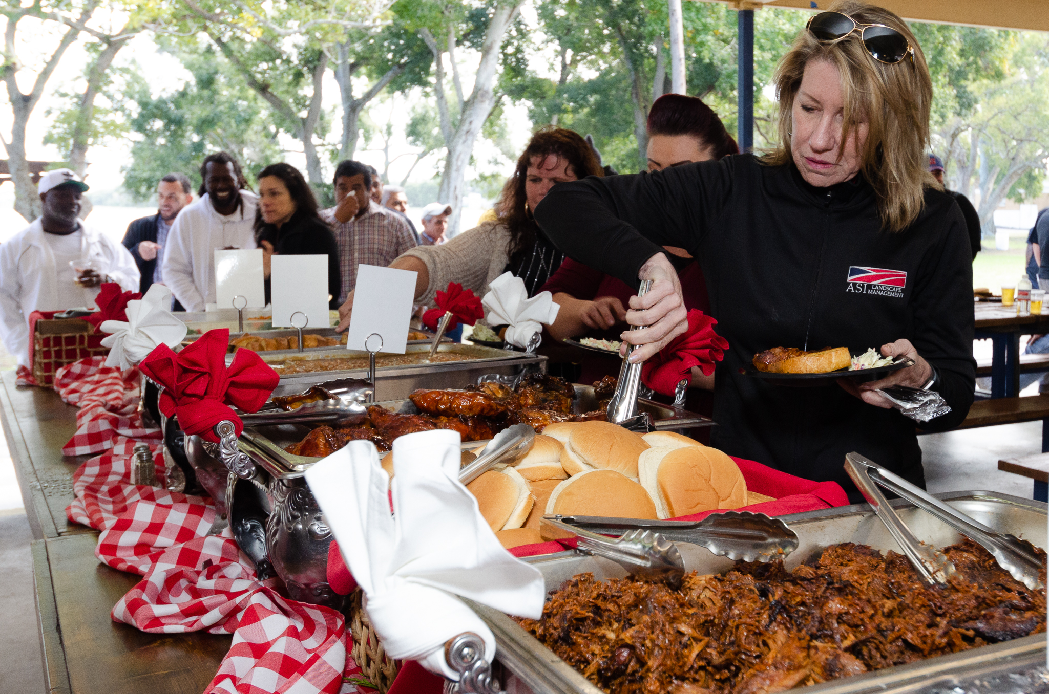 Curly Q's BBQ serving a catered event